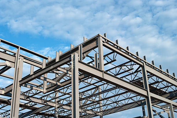 The steel frame of a new office building under construction.Similar Images.